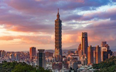 Photo by Timo Volz high rise building during sunset